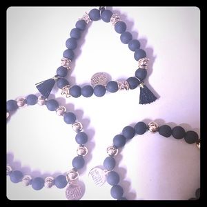 Three bracelets by Kinsley Armelle